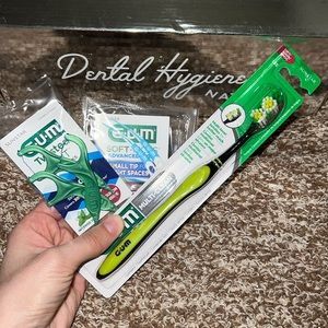 NEW G.U.M toothbrush and floss